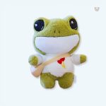 Peluche grenouille verte douce avec pull hiver