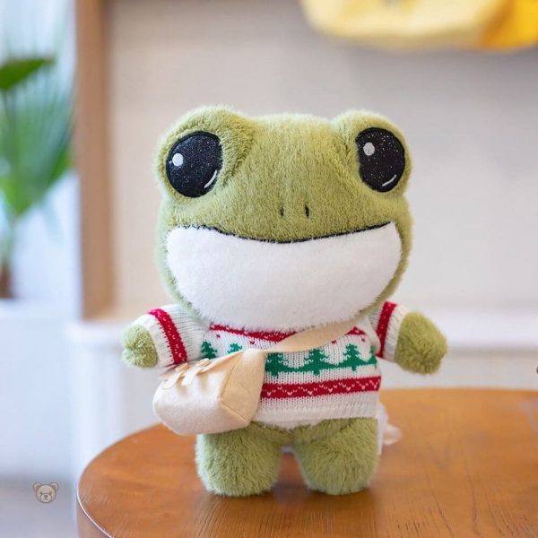 Peluche douce avec un pull d'hiver, compagnon idéal