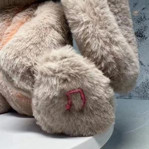 Peluche lapin berceuse, compagnon de sommeil apaisant