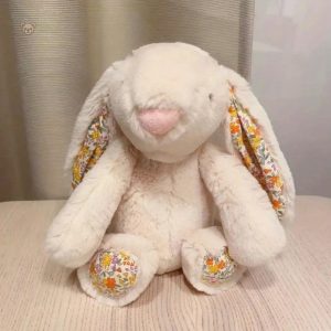 Peluche printemps lapin aux oreilles colorées