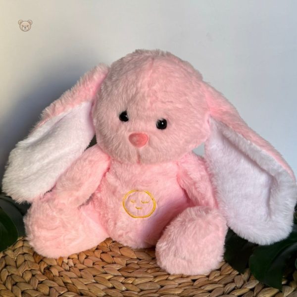 Veilleuse pour enfant : peluche lapin rose réconfortante