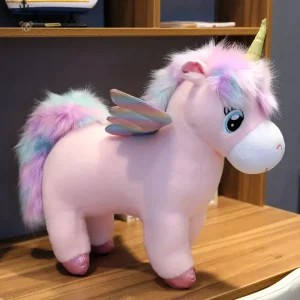 Peluche licorne rose avec ailes et corne dorée