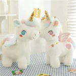 Peluche licorne blanche avec corne dorée