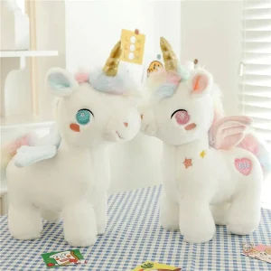 Peluche licorne blanche avec corne dorée