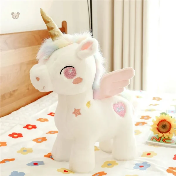 Licorne en peluche avec corne brillante