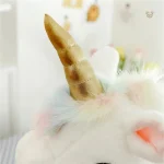 Peluche magique licorne avec ailes et étoiles
