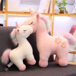 Peluche fleurie en forme de licorne
