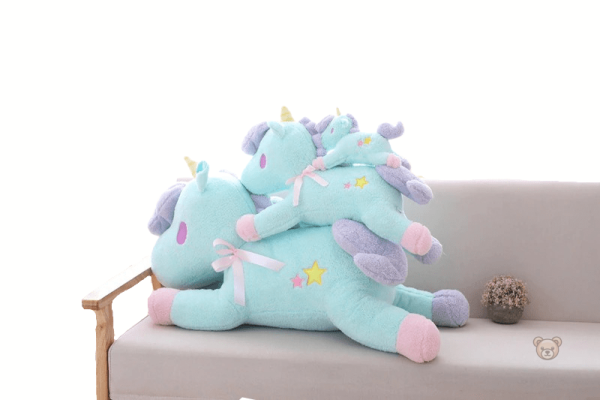Licorne douce aux couleurs pastel, peluche câline