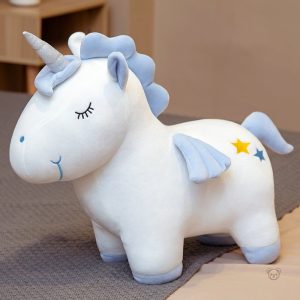 Peluche licorne magique aux teintes vives et cornet étincelant