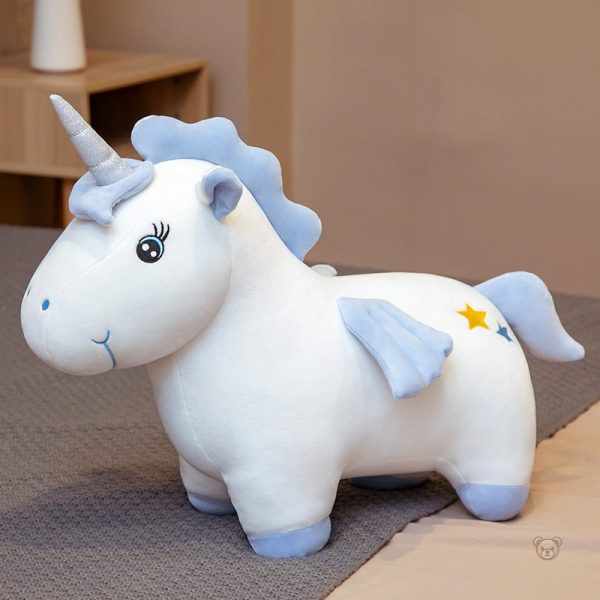 Jolie peluche licorne aux couleurs vives et cornet scintillant