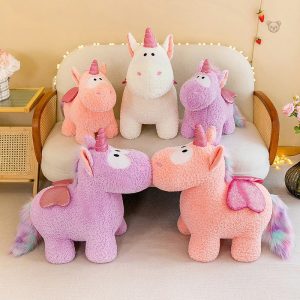Peluche licorne magique colorée avec ailes pailletées