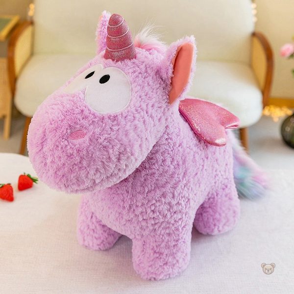 Peluche licorne aux couleurs vives et ailes scintillantes