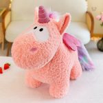 Peluche douce de licorne avec ailes brillantes