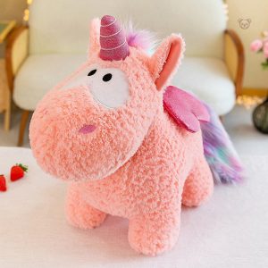 Peluche douce de licorne avec ailes brillantes