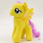 Peluche jaune licorne, compagnon idéal pour les rêves d'enfant