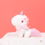 Mini peluche licorne avec détails scintillants et nœud