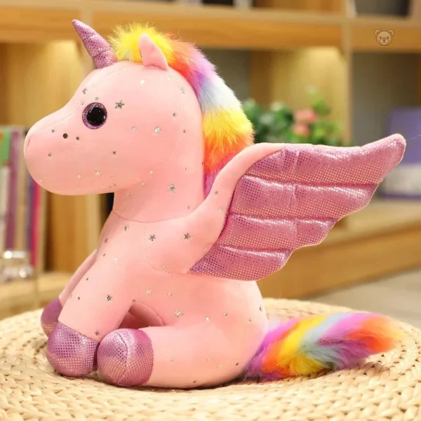 peluche-licorne-rose-a-criniere-arc-en-ciel-magique-1 Peluche licorne rose avec crinière arc-en-ciel