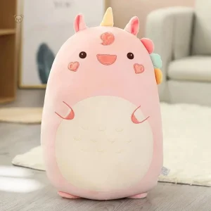 Peluche squishmallow rose en forme de licorne souriante