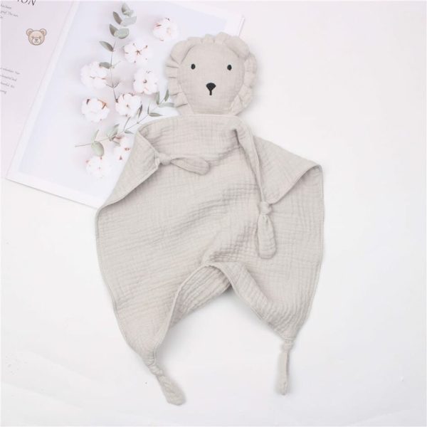 Câlinou lion en mousseline, compagnon idéal pour les petits