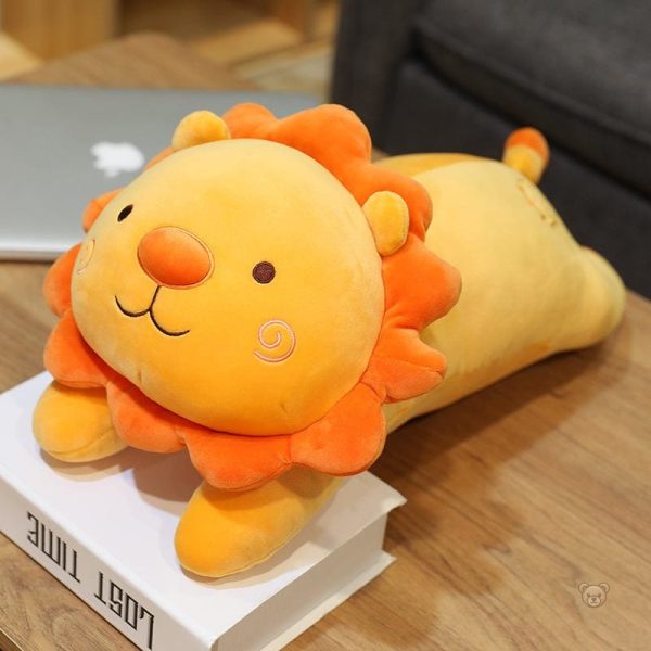 Peluche lion orange en position assise