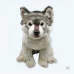 Peluche loup doux gris assis pour câlins d'hiver