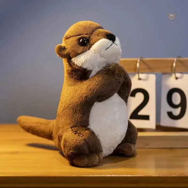 Loutre en peluche avec mains jointes, parfaite pour les câlins
