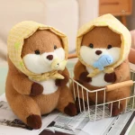 Peluche loutre avec voile tenant un poisson coloré