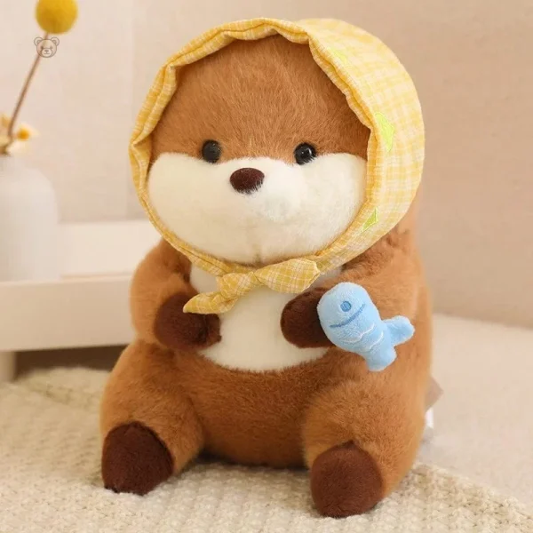 Peluche loutre adorable avec un poisson vibrant dans ses pattes