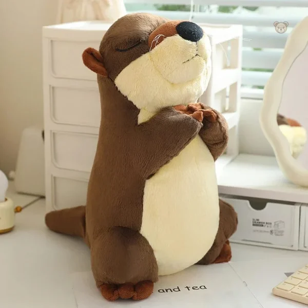 Peluche douce en forme de loutre pour les câlins