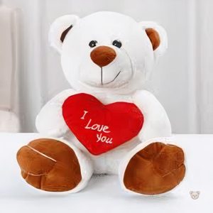 Ours en peluche blanc, compagnon douillet pour les froides nuits d'hiver