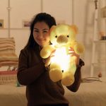 Peluche douce jaune avec lumière apaisante pour le sommeil