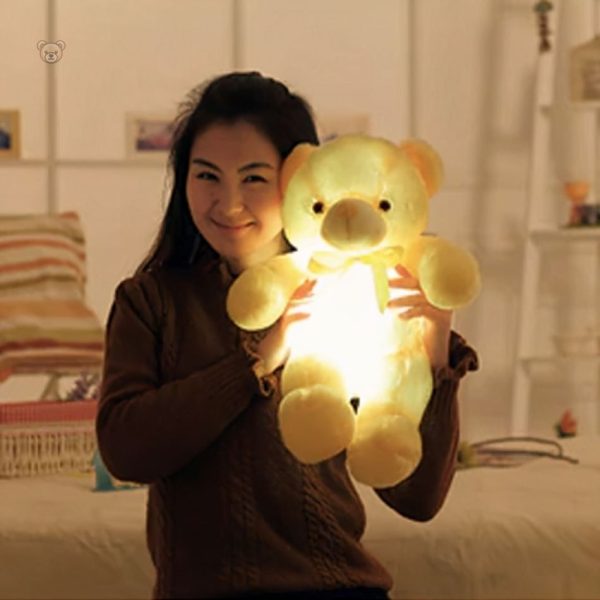 Peluche douce jaune avec lumière apaisante pour le sommeil