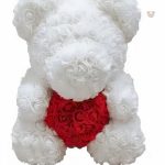 Ours en peluche rose, idéal pour le confort et la décoration enfantine