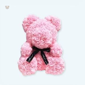 Peluche ours rose avec fleurs