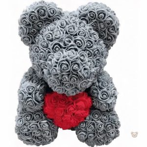 Ours câlin en peluche rose et grise, parfait pour le confort enfant