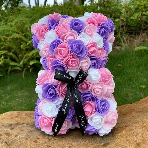 Peluche rose bicolore, parfait pour un message tendre