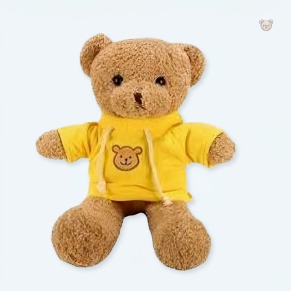 Peluche ourson jaune doux pour câlins d'hiver