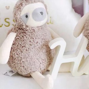 Peluche paresseux au pelage moelleux pour un confort optimal