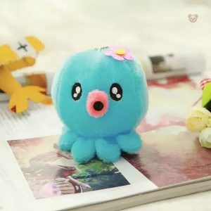 Peluche porte-clés bleue au design kawaii sympathique