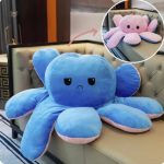 Peluche pieuvre géante aux couleurs joyeuses et tristes