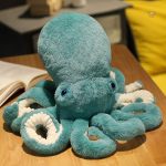 Peluche pieuvre en tissu doux pour les enfants heureux