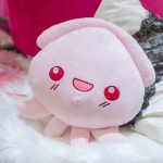 Peluche pieuvre rose expressive douce et amusante