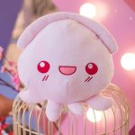 Peluche pieuvre rose avec expressions variées