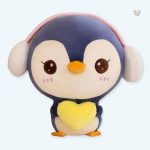 Peluche pingouin bleu doux avec cache oreilles pour l'hiver
