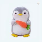 Peluche pingouin douce carotte pour câlins d'hiver