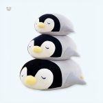 Peluche pingouin douce nuit pour câlins d'hiver enfant
