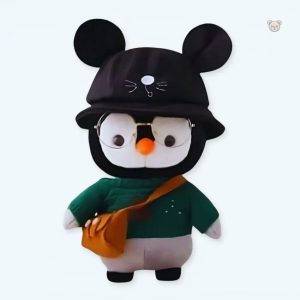 Peluche pingouin hiver avec pull vert doux pour câlins