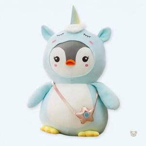 Peluche pingouin magique déguisée en licorne bleue douce