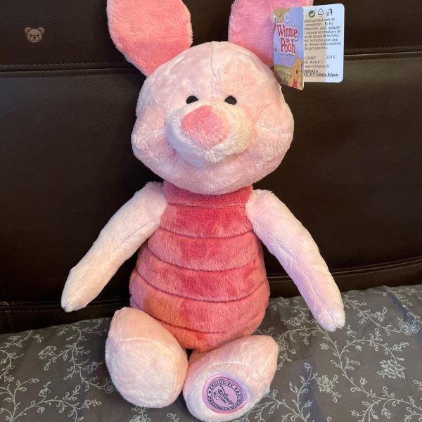 Porcinet en peluche Disney, personnage tendre et attachant