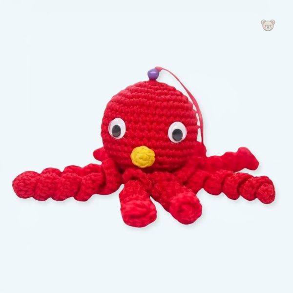 peluche-poulpe-rouge-enfant-doux-tresse-calin-ocean-1 Peluche poulpe rouge douce pour enfants, tressée et câline